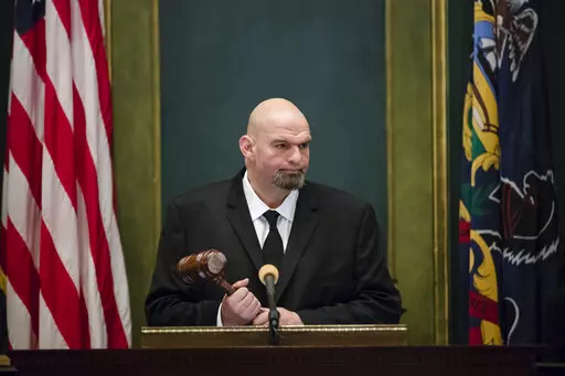 Pennsylvania Lt. Gov. John Fetterman John Fetterman holds a gavel after he was sworn into office on Jan. 15, 2019, at the state Capitol in Harrisburg, Pa. In 2019, Fetterman's first year in office, he regularly attended ribbon cuttings and conducted a statewide listening tour focused on legalizing marijuana. (AP Photo/Matt Rourke, File)