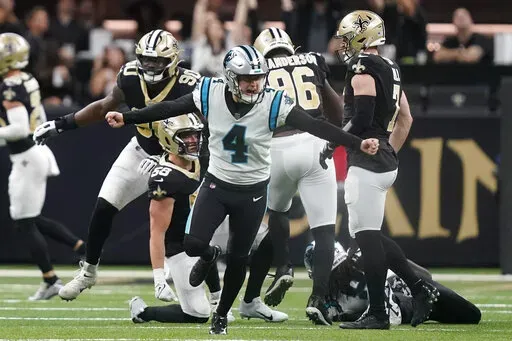 Carolina Panthers place kicker Eddy Pineiro celebrates after kicking the winning field goal during the second half an NFL football game between the Carolina Panthers and the New Orleans Saints in New Orleans, Sunday, Jan. 8, 2023. (AP Photo/Gerald Herbert)