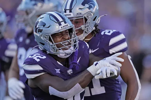 Kansas State linebacker Desmond Purnell (32) celebrates after a tackle during the first half of an NCAA college football game against UT Martin Saturday, Aug. 31, 2024, in Manhattan, Kan. (AP Photo/Charlie Riedel)