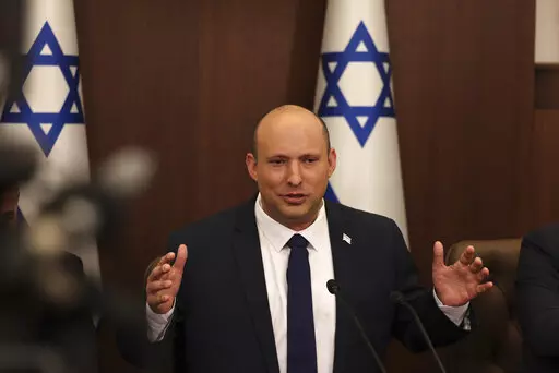 Israeli Prime Minister Naftali Bennett speaks during a weekly cabinet meeting in Jerusalem on Sunday, May 1, 2022. Bennett says he accepted an apology from Russian President Vladimir Putin for controversial remarks about the Holocaust made by Moscow’s top diplomat. But there was no mention of an apology in the Russian statement on Thursday, May 4,  call between the two leaders. (Menahem Kahana/Pool Photo via AP, File)
