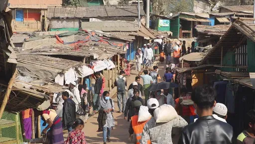 In this image from a video, Rohingya refugees walk at the Balukhali refugee camp in Cox's Bazar, Bangladesh, Feb. 2, 2021. A powerful ethnic armed group fighting Myanmar’s military government in the country’s western state of Rakhine claimed Saturday, May 18, 2024, to have seized a town near the border with Bangladesh, marking the latest in a series of victories for foes of the country’s military government. The state’s Muslim Rohingyas, targets of deadly army-directed violence in 2017, 