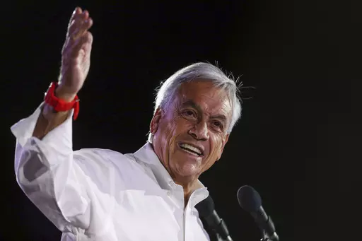 Sebastian Pinera, former Chilean president who is running again for office, addresses supporters at his closing campaign rally in Santiago, Chile, Nov. 16, 2017. Piñera died on Tuesday, Feb. 6, 2024 in a helicopter crash in Lago Ranco, Chile, according to Chilean Interior Minister Carolina Tohá who announced it on live TV. (AP Photo/Luis Hidalgo, File)