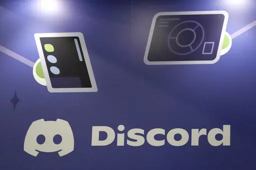 A display Discord stands at the company's booth at the Game Developers Conference 2023 in San Francisco on March 22, 2023. A major leak of classified U.S. documents that’s shaken Washington and exposed new details of its intelligence gathering may have started in a chatroom on the social media platform popular with gamers. (AP Photo/Jeff Chiu, File)