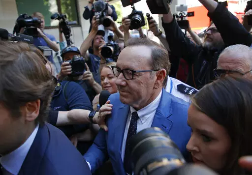Actor Kevin Spacey arrives at the Westminster Magistrates court in London, Thursday, June 16, 2022. Spacey is appearing in a court in London on Thursday after he was charged with sexual offenses against three men. The 62-year-old Spacey is accused of four counts of sexual assault and one count of causing a person to engage in penetrative sexual activity without consent. (AP Photo/David Cliff)