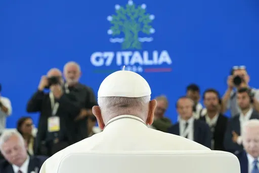 Pope Francis sits during a working session on AI, Energy, Africa and Mideast, at the G7, Friday, June 14, 2024, in Borgo Egnazia, near Bari, southern Italy. (AP Photo/Alex Brandon)