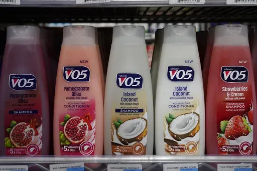 FILE—Plastic bottles of shampoo are displayed at Compton's Market in Sacramento, Calif., Friday, June 17, 2022. California lawmakers approved a measure, on Thursday, June 30, 2022, requiring companies selling plastics used for single-use products like eating utensils, food containers and shampoo bottles to cut down their use of the polluting product by 25% if they want to continue selling in California starting the next decade. (AP Photo/Rich Pedroncelli, File)