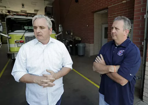 Timothy Stromsnes, left, then-president of the Reedy Creek Professional Firefighters, Local 2117, and Sean Pierce, then-union vice president, air concerns about the firefighting staff at Walt Disney World, May 28, 2019, in Lake Buena Vista, Fla. After more than four years of contentious negotiations, the board of Walt Disney World's governing district now made up of Florida Gov. Ron DeSantis appointees approved a contract for its firefighters on Wednesday, July 26, 2023, and also proposed reduci