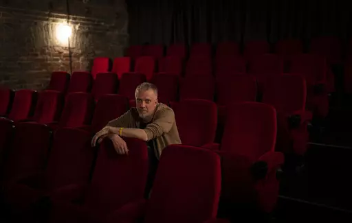 Ukrainian director and soldier Pavlo Yurov poses for a portrait in Kyiv, Wednesday, May 3, 2023. (AP Photo/Bernat Armangue)