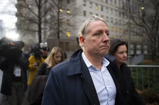 Charles McGonigal, former special agent in charge of the FBI's counterintelligence division in New York, leaves court, Monday, Jan. 23, 2023, in New York. The former high-ranking FBI counterintelligence official has been indicted on charges he helped a Russian oligarch, in violation of U.S. sanctions. (AP Photo/John Minchillo)