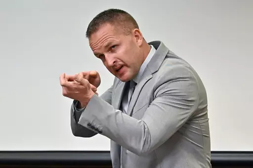 Former Louisville Police officer Brett Hankison describes what he saw in the apartment of Breonna Taylor during testimony, March 2, 2022, in Louisville, Ky. A federal judge on Thursday, Nov. 16, 2023 declared a mistrial in the trial of the former Louisville police officer who fired stray bullets in the deadly Breonna Taylor raid. Hankison was charged with using excessive force that violated the rights of Taylor, her boyfriend and her next-door neighbors. The 12-member jury struggled over several