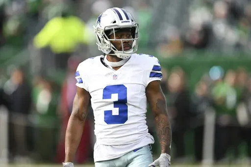 Dallas Cowboys wide receiver Brandin Cooks (3) looks on during pre-game warmups before an NFL football game against the Philadelphia Eagles, Dec. 29, 2024, in Philadelphia. (AP Photo/Terrance Williams, File)