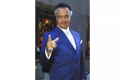 Tony Sirico who plays Paulie Walnuts on the HBO series "The Sopranos" arrives for the premiere of the show's fourth season in this Thursday, Sept. 5, 2002, at New York's Radio City Music Hall. Sirico, who played the impeccably groomed mobster Paulie Walnuts in “The Sopranos” and brought his tough-guy swagger to films including “Goodfellas,” died Friday, July 8, 2022. He was 79. (AP Photo/Tina Fineberg, File)