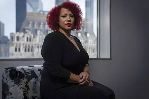 Journalist Nikole Hannah-Jones poses for a portrait at the headquarters of The Associated Press in New York, Friday, Dec. 10, 2021. (AP Photo/Robert Bumsted)