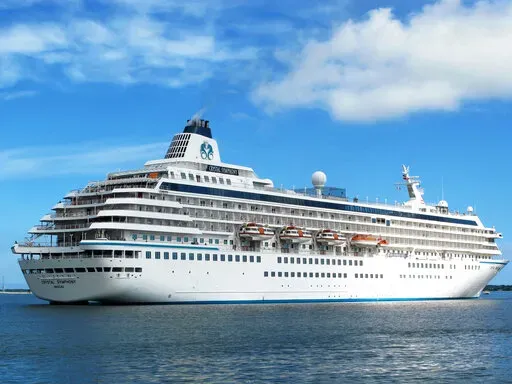 The cruise liner Crystal Symphony leaves the harbor in Charleston, S.C. on May, 21, 2013. Scheduled to arrive in Miami on Saturday, Jan. 22, 2022, the ship, with hundreds of passengers aboard, was diverted to the Bahamas after a U.S. judge granted an order to seize the vessel as part of a lawsuit over unpaid fuel. (AP Photo/Bruce Smith, File)