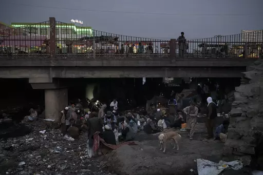 Afghans gather under a bridge to consume drugs, mostly heroin and methamphetamines in Kabul, Afghanistan, on Sept. 30, 2021. Afghanistan is the world’s fastest-growing maker of methamphetamine, a report from the United Nations drug agency said Sunday, Sept. 10, 2023. The country is also a major opium producer and heroin source, even though the Taliban declared a war on narcotics after they returned to power in August 2021.(AP Photo/Felipe Dana, File)