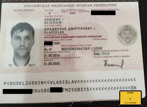 This image provided by the U.S. Attorney's Office, shows a Russian passport of Vladislav Klyushin, part of the government evidence entered into the record as exhibits in Klyushin's trial. Klyushin was sentenced Thursday, Sept. 7, 2023, to nine years in prison for his role in a nearly $100 million stock market cheating scheme that relied on secret earnings information stolen through the hacking of U.S. computer networks. ( U.S. Attorney's Office via AP)