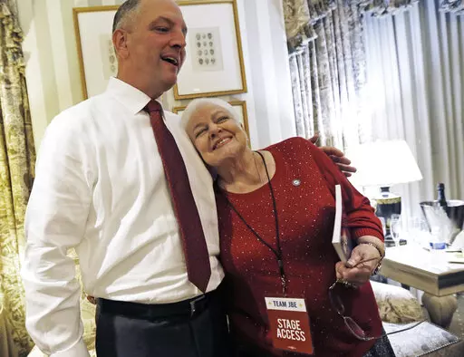 Louisiana Democratic gubernatorial candidate Rep. John Bel Edwards hugs his mother Dora Jean Edwards as he watches election returns in a hotel suite at his election night watch party in New Orleans, Saturday, Nov. 21, 2015. Dora Jean Edwards, the mother of Louisiana Gov. John Bel Edwards, has died, the governor announced in a Friday, Jan. 20, 2023. (AP Photo/Gerald Herbert, File)
