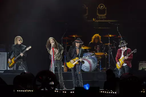 Tom Hamilton, from left, Steven Tyler, Joe Perry, John Douglas and Brad Whitford of Aerosmith, perform on Sept. 8, 2022, at Fenway Park in Boston. Aerosmith will be touring a city near you for the last time to celebrate their 50-plus years of being together. The Rock & Roll Hall of Fame band announced Monday, May 1, 2023 the dates for their farewell tour called “Peace Out” starting Sept. 2 in Philadelphia. (Photo by Winslow Townson/Invision/AP, file)