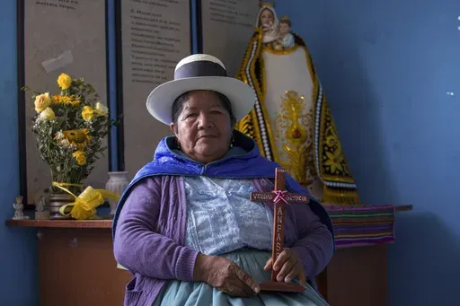 Lidia Flores, the leader of the National Association of Relatives of Detained and Disappeared Persons of Peru, poses for a portrait in Ayacucho, Peru, Tuesday, Oct. 22, 2024. Flores' husband was killed in Peru's internal armed conflict (1980-2000). (AP Photo/Silvio La Rosa)