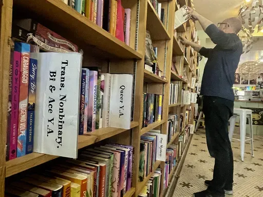 An LGBTQ+ related book is seen on shelf at Fabulosa Books a store in the Castro District of San Francisco on Thursday, June 27, 2024. (AP Photo/Haven Daley,File)