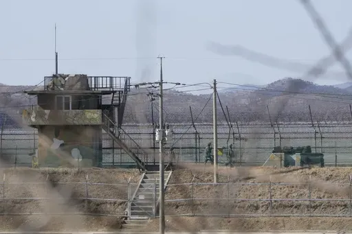 South Korean army soldiers patrol along the barbed-wire fence in Paju, South Korea, near the border with North Korea, on Feb. 18, 2025. (AP Photo/Ahn Young-joon, File)