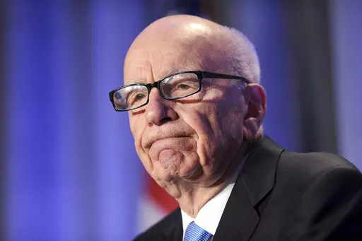 In this Oct. 14, 2011, file photo, News Corp. CEO Rupert Murdoch delivers a keynote address at the National Summit on Education Reform in San Francisco. Murdoch stirs mixed feelings in Britain, where he transformed the media over half a century. U.K. journalists and politicians are both hailing and reviling the 92-year-old mogul after he announced he was stepping down as leader of his media empire. (AP Photo/Noah Berger, File)