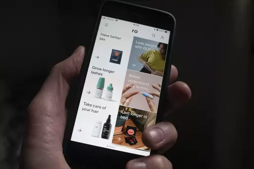 The website for the company Ro is seen on a smartphone in New York on Thursday, Dec. 7, 2023. Online, direct-to-consumer health care has grown well beyond its roots mostly treating hair loss and acne or selling birth control pills. Companies like Hims & Hers and Ro have started weight loss programs. (AP Photo/Patrick Sison)