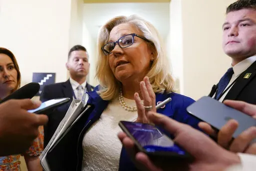 Vice chair Rep. Liz Cheney, R-Wyo., speaks with members of the press after a House select committee hearing investigating the Jan. 6 attack on the U.S. Capitol continues to reveal its findings of a year-long investigation, at the Capitol in Washington, Tuesday, June 21, 2022. (AP Photo/Patrick Semansky)