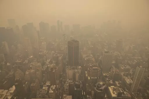Haze from wildfires in Canada is visible in New York City from the Empire State Building observatory, June 7, 2023, in New York. (AP Photo/Yuki Iwamura, File)