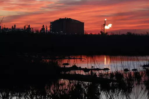 A flare burns at Venture Global LNG in Cameron, La., April 21, 2022. Louisiana lost more than $82 million worth of natural gas in 2019 due to leaks, venting or flaring at production sites according to a study released Thursday, April 13, 2023, by an environmental group and government watchdog organizations. The Environmental Defense Fund’s report said state fossil fuel producers wasted more than 27 billion cubic feet of gas in 2019. (AP Photo/Martha Irvine, File)