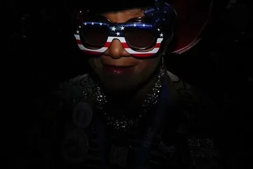 North Carolina delegate Gloria Goodwin wears sunglasses during the Democratic National Convention Wednesday, Aug. 21, 2024, in Chicago. (AP Photo/Brynn Anderson)