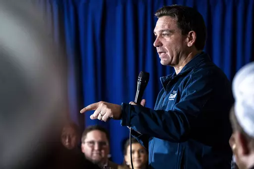 Republican presidential candidate and Florida Gov. Ron DeSantis speaks during the final event of a 99-county tour of Iowa, Saturday, Dec. 2, 2023, in Newton. (Lily Smith/The Des Moines Register via AP)