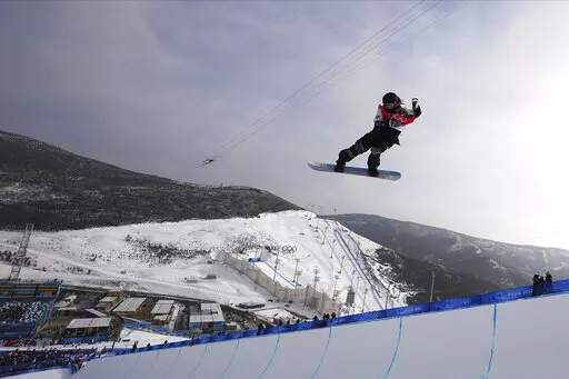 United States' Chloe Kim competes during the women's halfpipe finals at the 2022 Winter Olympics, Feb. 10, 2022, in Zhangjiakou, China. (AP Photo/Gregory Bull, File)