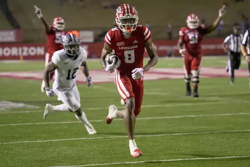 Louisiana wide receiver Michael Jefferson (8) scores a touchdown against Georgia Southern during an NCAA football game Nov. 10, 2022, in Lafayette, La. NFL prospect Jefferson was involved in a fatal car accident. Jefferson's agent, Jon Perzley, told ESPN that the player suffered injuries in the accident Sunday evening, April 9, 2023, that required multiple operations. Perzley did not immediately respond to an email sent by The Associated Press on Wednesday. (AP Photo/Matthew Hinton, File)