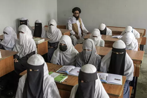 Afghan girls attend a religious school, which remained open since the last year's Taliban takeover, in Kabul, Afghanistan, on Aug. 11, 2022. Two years after the Taliban banned girls from school beyond sixth grade, Afghanistan is the only country in the world with restrictions on female education. Now, the rights of Afghan women and children are on the agenda of the United Nations General Assembly Monday, Sept. 18, 2023, in New York. (AP Photo/Ebrahim Noroozi, File)