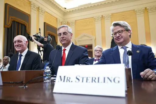 Rusty Bowers, Arizona state House Speaker, from left, Brad Raffensperger, Georgia Secretary of State, and Gabe Sterling, Georgia Deputy Secretary of State, arrive as the House select committee investigating the Jan. 6 attack on the U.S. Capitol continues to reveal its findings of a year-long investigation, at the Capitol in Washington, Tuesday, June 21, 2022. (AP Photo/Jacquelyn Martin)