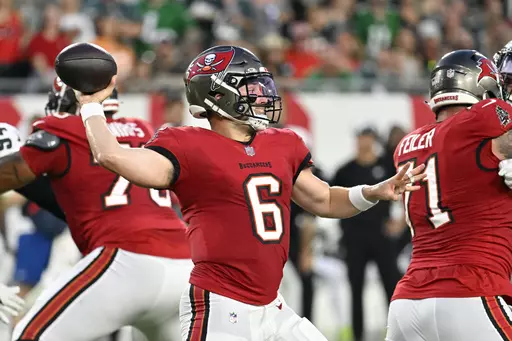 Tampa Bay Buccaneers' Baker Mayfield passes during the first half of an NFL football game against the Philadelphia Eagles, Monday, Sept. 25, 2023, in Tampa, Fla. (AP Photo/Jason Behnken)