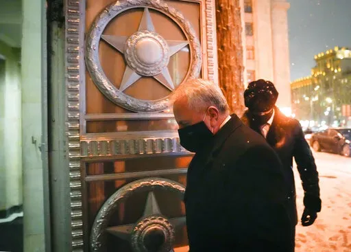 U.S. Ambassador to Russia John Sullivan enters the Russian Foreign Ministry building in Moscow, Russia, Wednesday, Jan. 26, 2022. Sullivan delivered a U.S. response to the Russian demands for security guarantees over NATO and Ukraine. (AP Photo/Alexander Zemlianichenko)