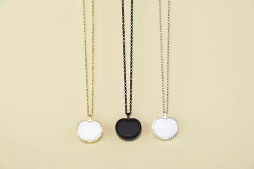 This image provided by Bond-Touch shows the Bond Heart smart necklace, which stores and plays heartbeats with the help of an app. Think outside the box for Mother's Day gifts this year. (Bond-Touch via AP).