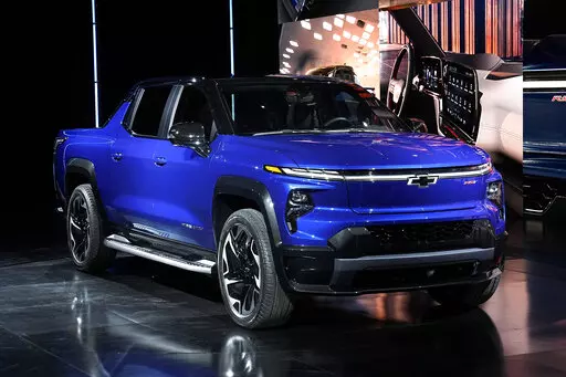 The 2024 Chevrolet Silverado EV RST is shown in Detroit, Wednesday, Jan. 5, 2022.  General Motors expects its portfolio of electric vehicles to turn a profit in North America by 2025. That will come as it boosts battery and assembly plant capacity to build over 1 million EVs per year.  (AP Photo/Paul Sancya, File)