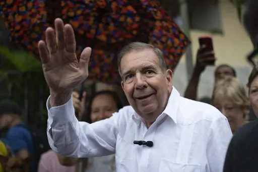 Venezuelan opposition presidential candidate Edmundo Gonzalez waves to supporters during a political event at a square in the Hatillo municipality of Caracas, Venezuela, June 19, 2024. (AP Photo/Ariana Cubillos, File)