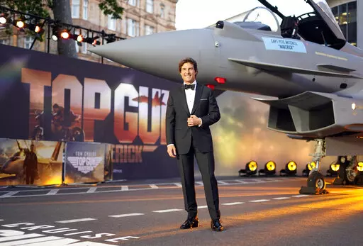 Tom Cruise poses for the media during the 'Top Gun Maverick' UK premiere at a central London cinema, on Thursday, May 19, 2022. (AP Photo/Alberto Pezzali)
