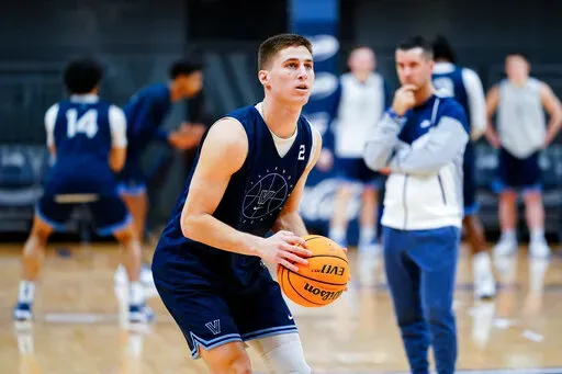 Villanova NCAA college basketball player Collin Gillespie practices at Villanova, Pa., Wednesday, March 30, 2022. Villanova will face Kansas in the men's Final Four NCAA college basketball tournament in New Orleans. (AP Photo/Matt Rourke)