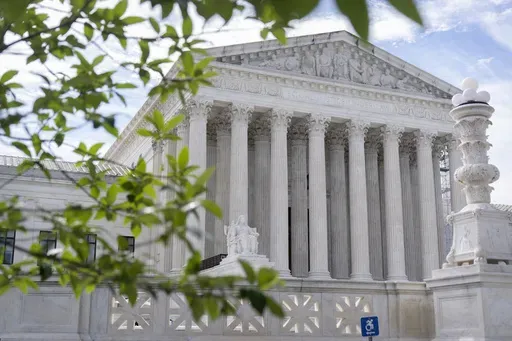 The Supreme Court building is seen on June 27, 2024, in Washington. Supreme Court justices will take the bench Monday, July 1, to release their last few opinions of the term, including their most closely watched case: whether former President Donald Trump has immunity from criminal prosecution. (AP Photo/Mark Schiefelbein, File)