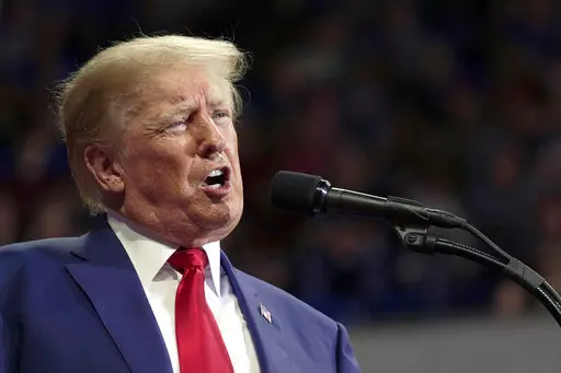 Former President Donald Trump speaks at a rally in Wilkes-Barre, Pa., Saturday, Sept. 3, 2022. The Trump Organization is going on trial accused of helping some top executives avoid income taxes on compensation they got in addition to their salaries, like rent-free apartments and luxury cars. (AP Photo/Mary Altaffer, File)