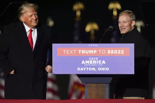 Former President Donald Trump welcomes Rep. Jim Jordan, R-Ohio, to the stage at a campaign rally in support of the campaign of Ohio Senate candidate JD Vance at Wright Bros. Aero Inc. at Dayton International Airport on Monday, Nov. 7, 2022, in Vandalia, Ohio. (AP Photo/Michael Conroy, File)