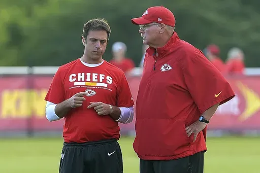 Kansas City Chiefs general manager Brett Veach talks with coach Andy Reid during NFL football training camp Thursday, Aug 3, 2017, in St. Joseph, Mo. (Jessica A. Stewart/The St. Joseph News-Press via AP, File)