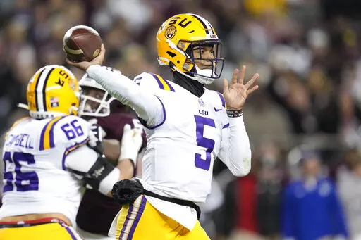 LSU quarterback Jayden Daniels throws a pass against Texas A&M during the second quarter of an NCAA college football game Saturday, Nov. 26, 2022, in College Station, Texas. (AP Photo/Sam Craft)