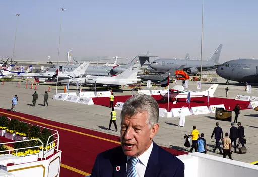 Paul Griffiths, the CEO of Dubai Airports, speaks to The Associated Press at the Dubai Air Show in Dubai, United Arab Emirates, Nov. 15, 2021. Dubai's main airport said Tuesday it has retained its top place as the world's busiest for international travel with around 29 million passengers shuttling through the global gateway last year. Griffiths, said DXB forecasts 57 million travelers to come through the airport this year, and a full recovery to pre-pandemic figures by 2024. (AP Photo/Jon Gambre