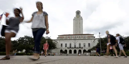 Students walk on the University of Texas campus in Austin, Texas., Sept. 27, 2012. (AP Photo/Eric Gay, File)